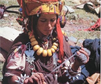 Weaving yarn by a Berber lady from the Atlas Mountains